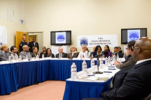 Mayor Emanuel and Chief Procurement Officer Jamie Rhee listen as business owners discuss their challenges at the Chatham Business Association Roundtable